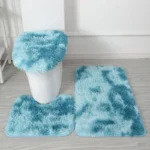 Plush bathroom rug set with toilet lid cover and mat in a cozy bathroom