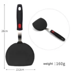 Goldoma high heat resistant spatula in use on a non-stick frying pan