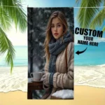 Custom photo beach towel with a vibrant family photo, lying on the sand near the ocean