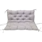 Outdoor bench cushion on a wooden garden bench with vibrant floral pattern