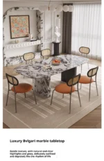 Elegant cream marble french style dining table in a bright dining room