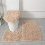 Plush bathroom rug set with toilet lid cover and mat in a cozy bathroom
