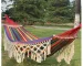 Bohemian double hammock with tassels in garden