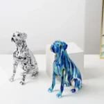 Colorful boxer dog resin ornament on a wine cabinet, splash paint design.