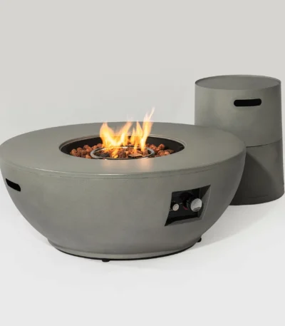 50,000 BTU fire pit table with grey steel finish and propane tank holder on a patio