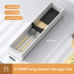 Kitchen drawer organizer with compartments for cutlery and utensils