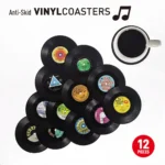 Set of vinyl record coasters on a wooden table