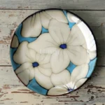 Ceramic dinnerware set with Japanese flat serving plates in floral Nordic design