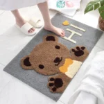 Non slip bathroom rug with frog and bear flocking design on bathroom floor