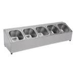 Stainless steel spice rack with 5 pans and lids on kitchen countertop