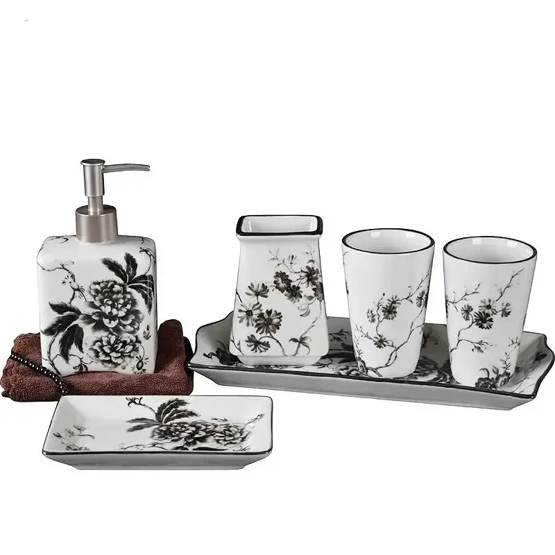 Chinese ceramic toothbrush holder with blue floral pattern, standing on a white bathroom counter.
