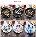Gold flatware set with spoon, fork, and steak knife on a white tablecloth
