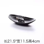 Black melamine dinner plates stacked elegantly on a wooden table