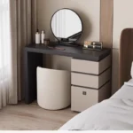 Minimalist wood dressing table with mirror and three storage drawers in modern bedroom setting