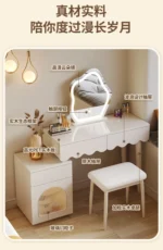 Modern makeup vanity desk with mirror and stool in a bedroom setting, showcasing ample storage and elegant design