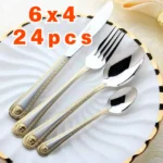 Gold plated flatware set 24-piece vintage western dinner fork knife spoon on table
