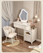 Modern wood makeup vanity table with mirror, drawer, and stool in a bedroom setting
