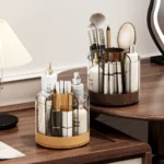 Pen storage cup with a smiling face design, placed on a desk with a coffee mug and plant.