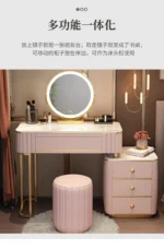 French white wooden dressing table with mirror and stool in a modern bedroom setting