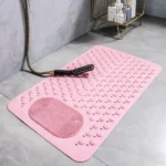 Oblong non-slip bath mat with suction cups on shower floor