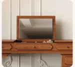 Minimalist oak wood dressing table with mirror, stool, and six drawers in a modern bedroom setting