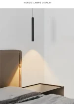 Modern pendant light with double cylindrical shades in a Nordic dining room setting