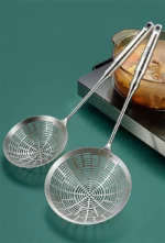 Three sizes of 304 stainless steel strainer with long handles on a kitchen counter