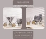 Elegant luxury crystal stemware diamond glass wine goblets on a table setting