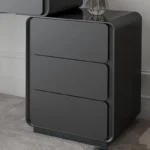Modern makeup vanity table with mirror and storage drawer in bedroom setting