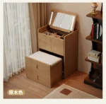 Wooden makeup vanity with mirror and stool in a modern bedroom setting