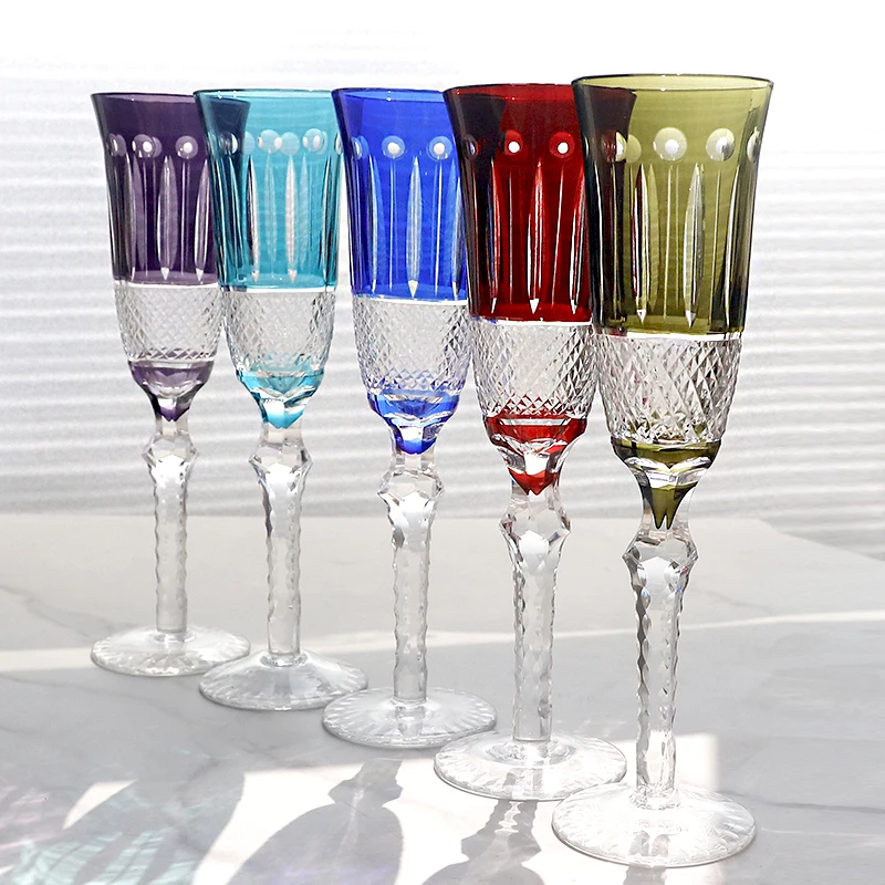 Hand-carved Edo Kiriko wine glass in multicolor crystal flute on white background