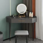 Goldoma modern corner dressing table with mirror and stool in a bedroom