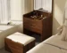 Compact LED makeup vanity desk with mirror and stool in a modern bedroom