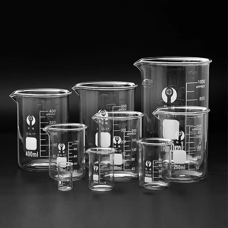Borosilicate glass measuring cup with clear measurement marks on a kitchen counter
