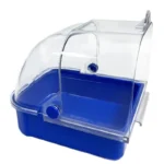 Bird bath tub with a parakeet inside, wings spread, bathing.
