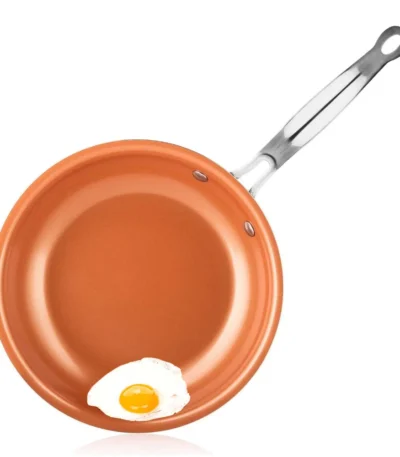 Goldoma nonstick frying pan with ceramic titanium coating on a stove