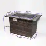 Rectangular propane fire pit table with tile top and wicker base on patio