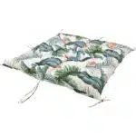 Outdoor bench cushion on a wooden garden bench with vibrant floral pattern