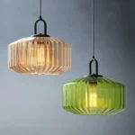Modern colored glass pendant lamp illuminating a cozy dining room with vibrant hues