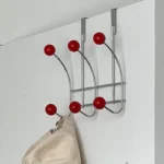 Goldoma over door organizer with 10 hooks holding coats and bags