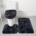 Plush bathroom rug set with toilet lid cover and mat in a cozy bathroom