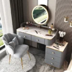 White MDF dressing table with mirror and stool in a modern bedroom setting