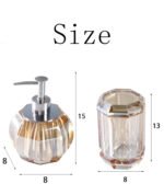Clear glass bottle with golden liquid inside.