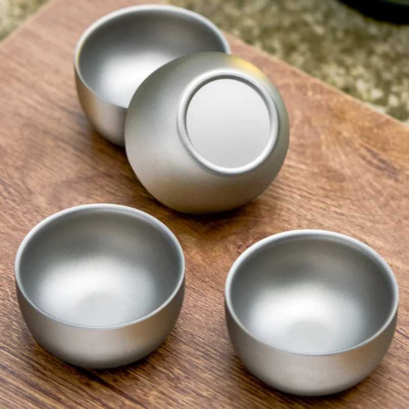 Double wall tea cup with pure titanium construction and insulation for hot tea