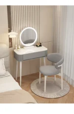 Modern storage vanity table with mirror and stool featuring multiple drawers for bedroom organization