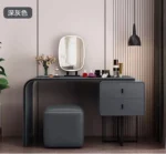 modern extendable dressing table with mirror and stool in a bedroom