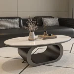 Modern coffee table with sintered stone top in black frame and bright fish belly white finish, rectangular shape