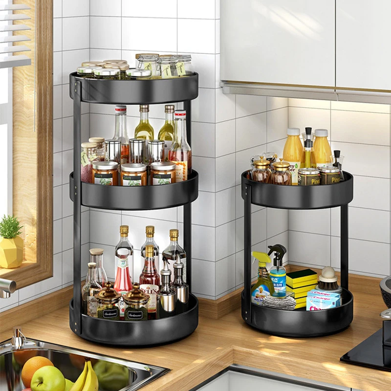 S65b799380246404d861385b467df8bfds.webp Goldoma rotating spice rack filled with spice jars on a kitchen counter