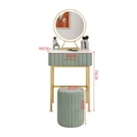 Marble top dressing table with lighted mirror and stool in a bedroom setting