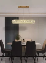 Luxury crystal chandelier illuminating a modern living room with sparkling light